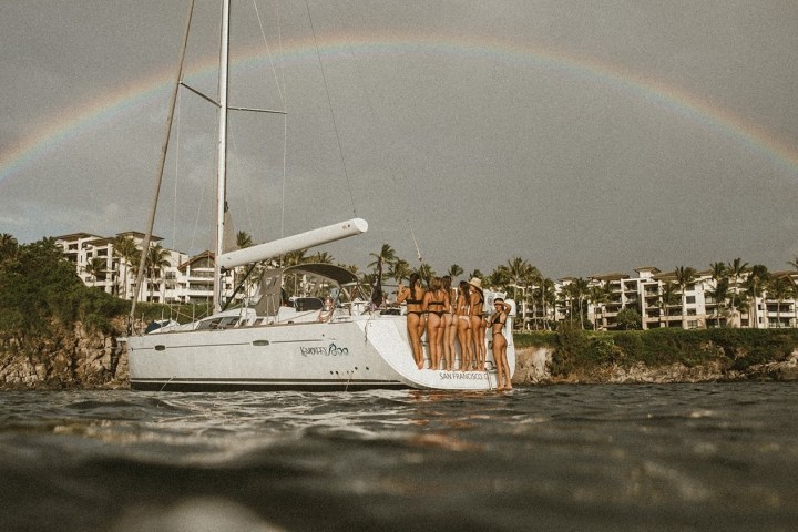 a rainbow over a body of water